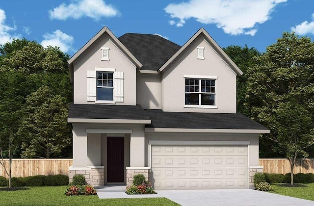 view of front of property featuring a garage and a front yard