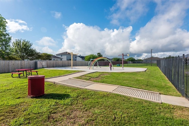 view of community with a yard