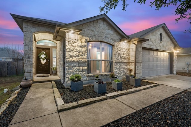 ranch-style house with a garage