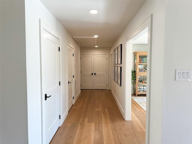 hallway featuring light wood-type flooring