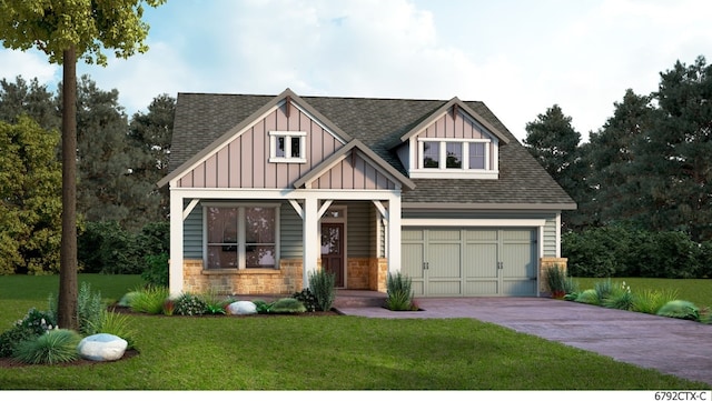 craftsman house featuring a garage and a front yard