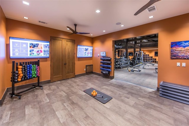 exercise room featuring hardwood / wood-style flooring and ceiling fan