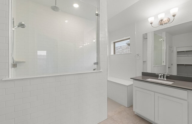 6420 Apache Plum Ln, Spicewood, TX 78669 - full bath with a walk in shower, vanity, tile patterned flooring, a walk in closet, and a chandelier