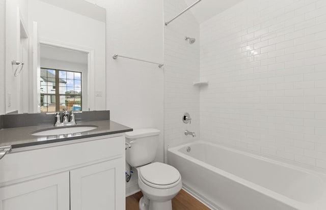 6420 Apache Plum Ln, Spicewood, TX 78669 - bathroom with vanity, shower / bathtub combination, and wood finished floors
