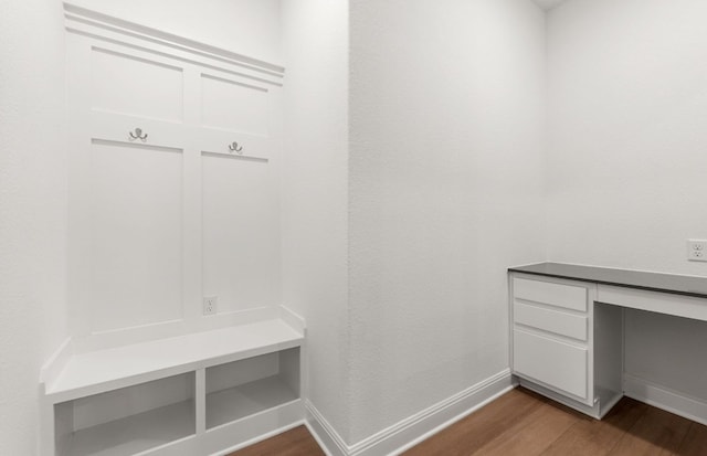 6420 Apache Plum Ln, Spicewood, TX 78669 - mudroom featuring wood finished floors and baseboards