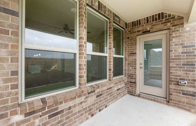 6420 Apache Plum Ln, Spicewood, TX 78669 - property entrance featuring brick siding