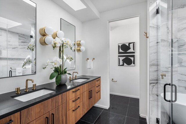 bathroom featuring vanity, tile patterned floors, and walk in shower