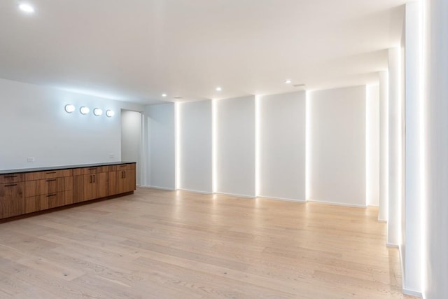 spare room featuring light hardwood / wood-style floors