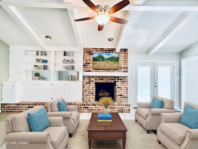 living room featuring a fireplace, lofted ceiling with beams, light tile patterned floors, ceiling fan, and a textured ceiling