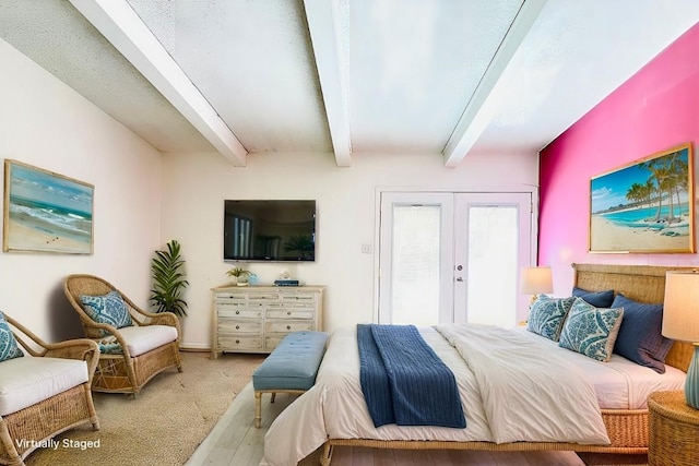 bedroom featuring light colored carpet, access to exterior, beam ceiling, and french doors