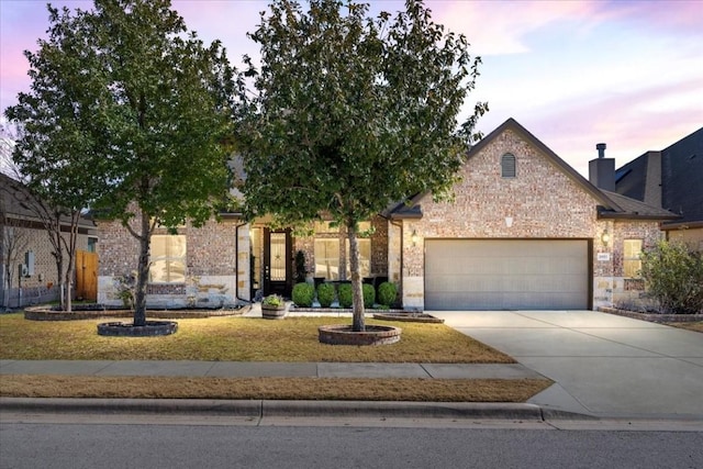 view of front of property with a garage