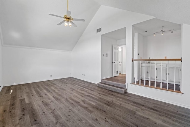 additional living space featuring lofted ceiling, hardwood / wood-style flooring, and ceiling fan