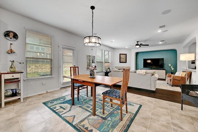 7617 Ballydawn Dr, Austin, TX 78744 - dining space with a ceiling fan, tile patterned flooring, recessed lighting, and baseboards