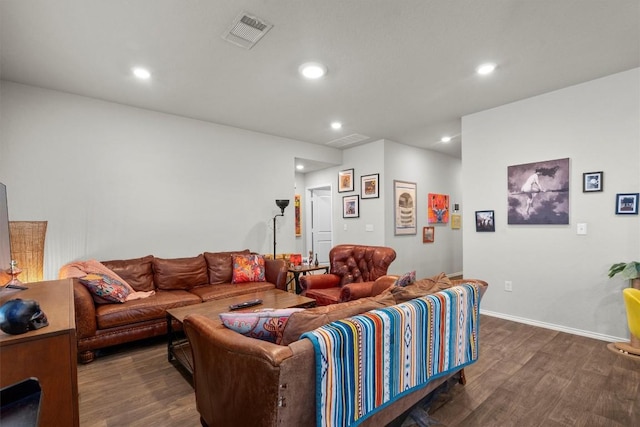 living room featuring dark hardwood / wood-style floors