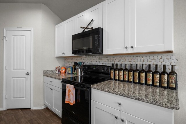 kitchen featuring stone counters, white cabinets, and black appliances