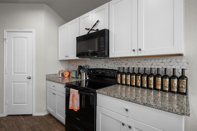 kitchen with stone countertops, white cabinetry, and black appliances