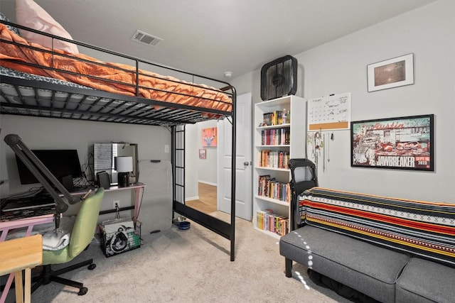 bedroom featuring light colored carpet