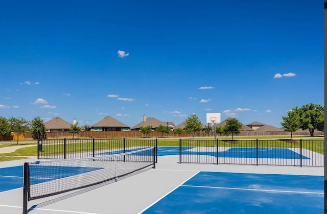 view of sport court with tennis court