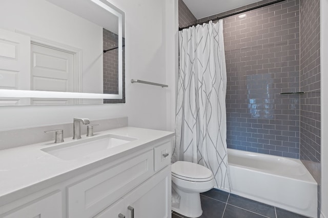 full bathroom featuring tile patterned flooring, vanity, toilet, and shower / bath combo