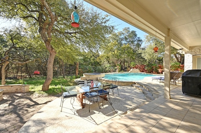 12304 Aralia Ridge Dr, Austin, TX 78739 - fenced backyard featuring a patio, view of scattered trees, grilling area, and a pool with connected hot tub
