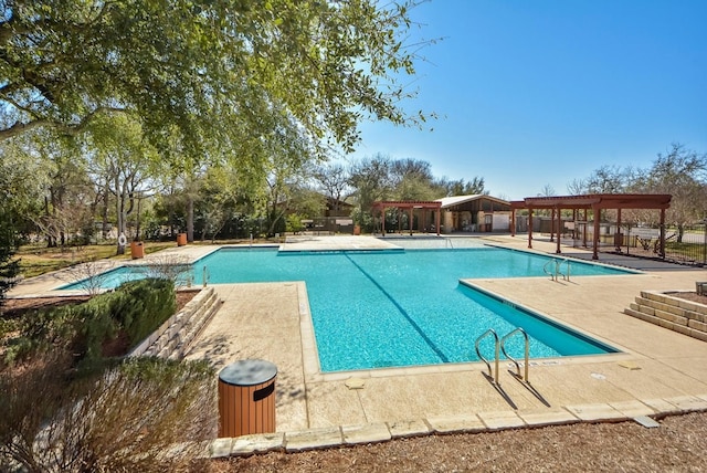 view of pool with a patio area and a pergola