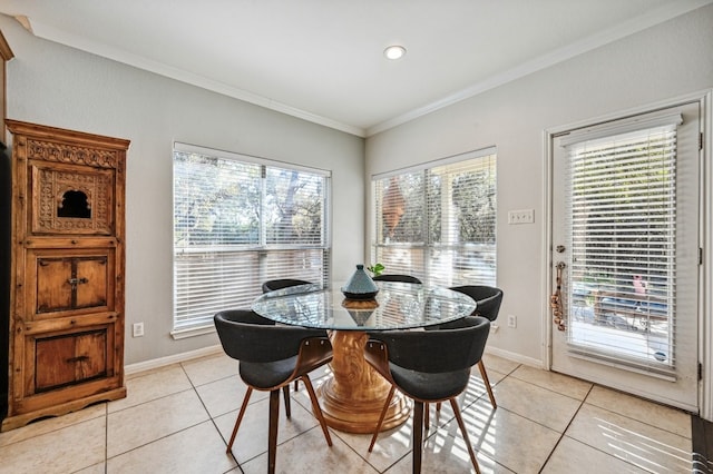12304 Aralia Ridge Dr, Austin, TX 78739 - dining room featuring light tile patterned flooring, crown molding, and baseboards