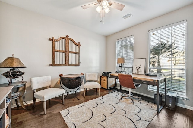 home office featuring ceiling fan and dark hardwood / wood-style flooring