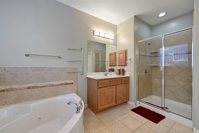 bathroom with tile patterned floors, vanity, and plus walk in shower