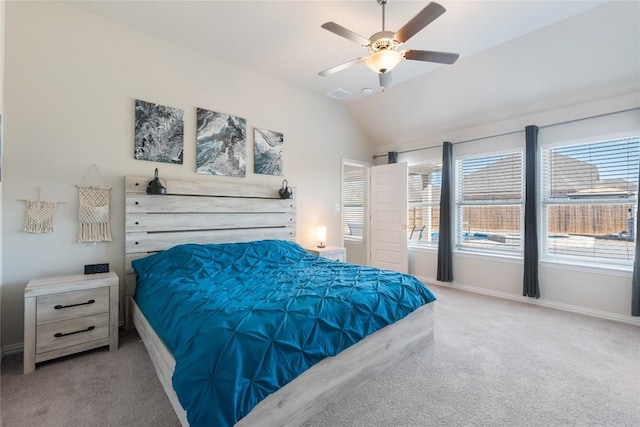 carpeted bedroom featuring ceiling fan and lofted ceiling