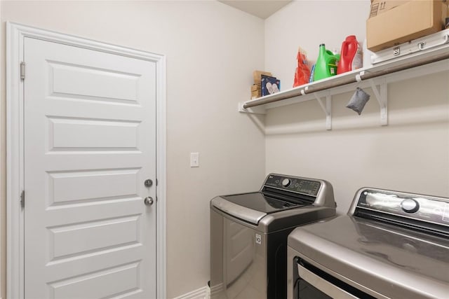 laundry room with washer and dryer