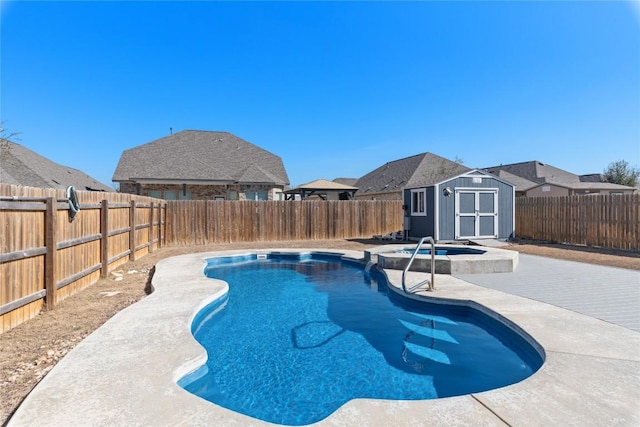 view of pool with a patio and a shed