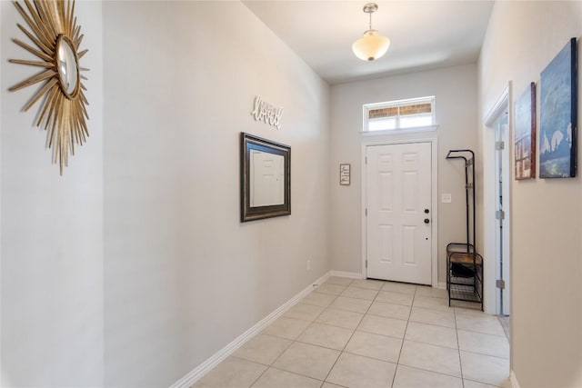 foyer featuring light tile patterned floors