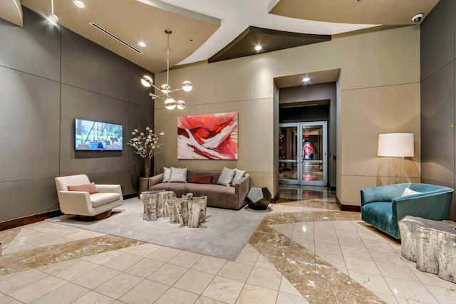 360 Nueces St Unit 914, Austin, TX 78701 - community lobby with recessed lighting, a towering ceiling, and a surveillance system