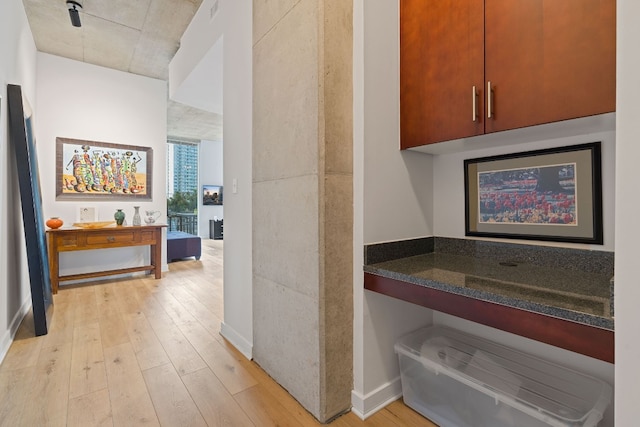 360 Nueces St Unit 914, Austin, TX 78701 - hall with light wood finished floors and baseboards