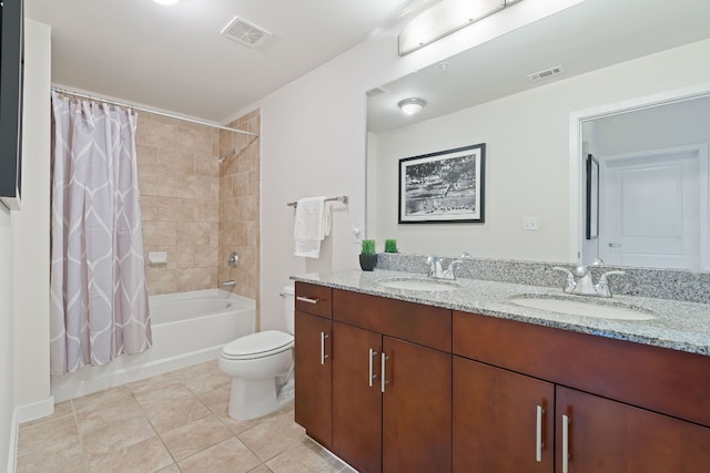 360 Nueces St Unit 914, Austin, TX 78701 - bathroom with double vanity, shower / bath combination with curtain, tile patterned floors, and toilet