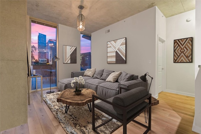 360 Nueces St Unit 914, Austin, TX 78701 - living room featuring light wood finished floors