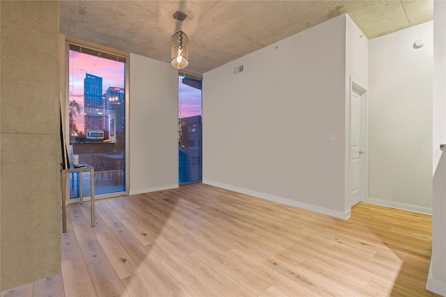 360 Nueces St Unit 914, Austin, TX 78701 - spare room with wood finished floors and baseboards