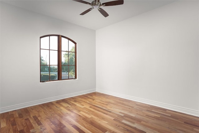 unfurnished room with ceiling fan and light wood-type flooring