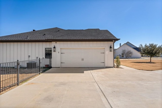 view of side of home with a garage