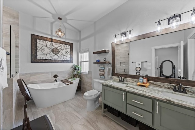 bathroom featuring vanity, separate shower and tub, and tile walls