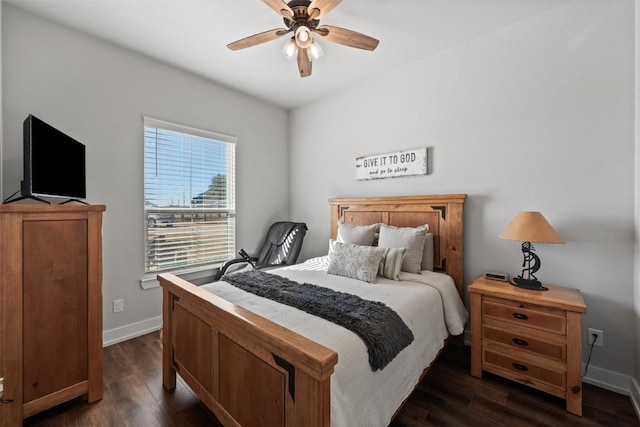 bedroom with dark hardwood / wood-style floors and ceiling fan