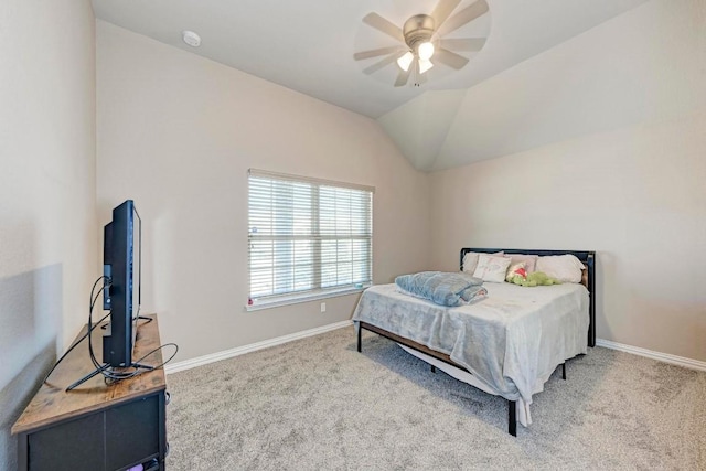 carpeted bedroom featuring ceiling fan and lofted ceiling