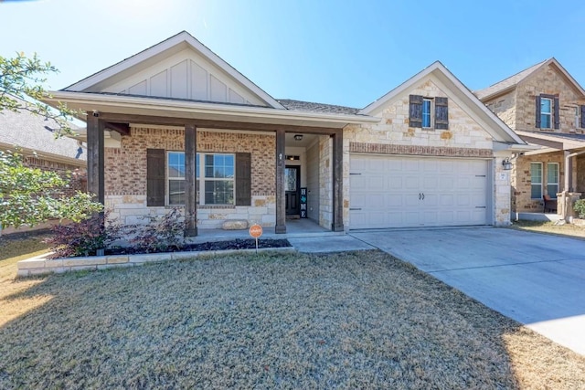 view of front of home featuring a garage and covered porch