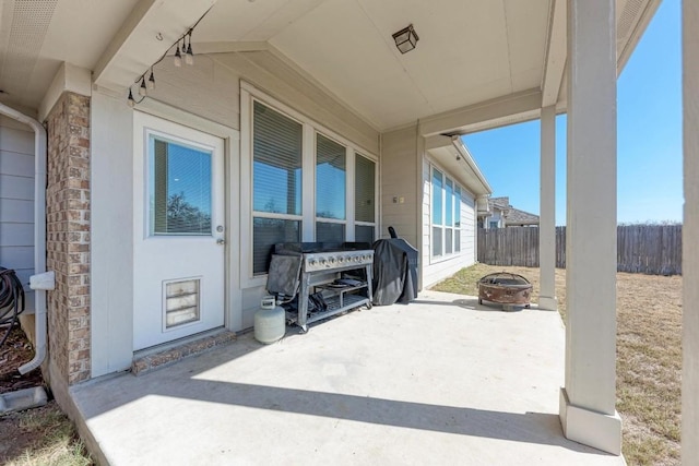 view of patio / terrace featuring area for grilling and an outdoor fire pit