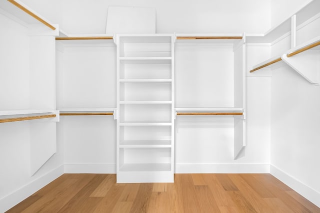 walk in closet featuring hardwood / wood-style floors