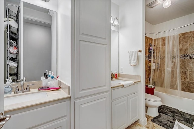 full bathroom with shower / bath combination with curtain, vanity, and toilet