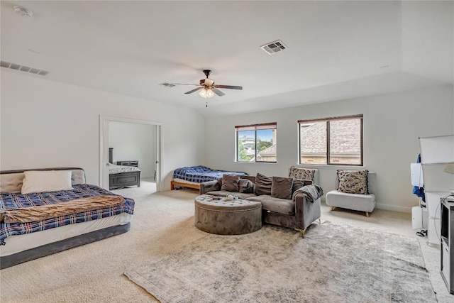 carpeted bedroom featuring ceiling fan and lofted ceiling