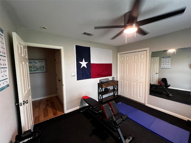 workout room with ceiling fan