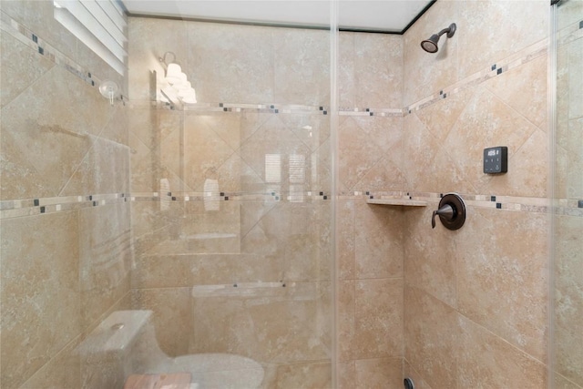 bathroom with tiled shower