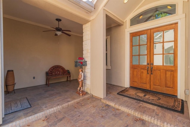 property entrance with ceiling fan and french doors